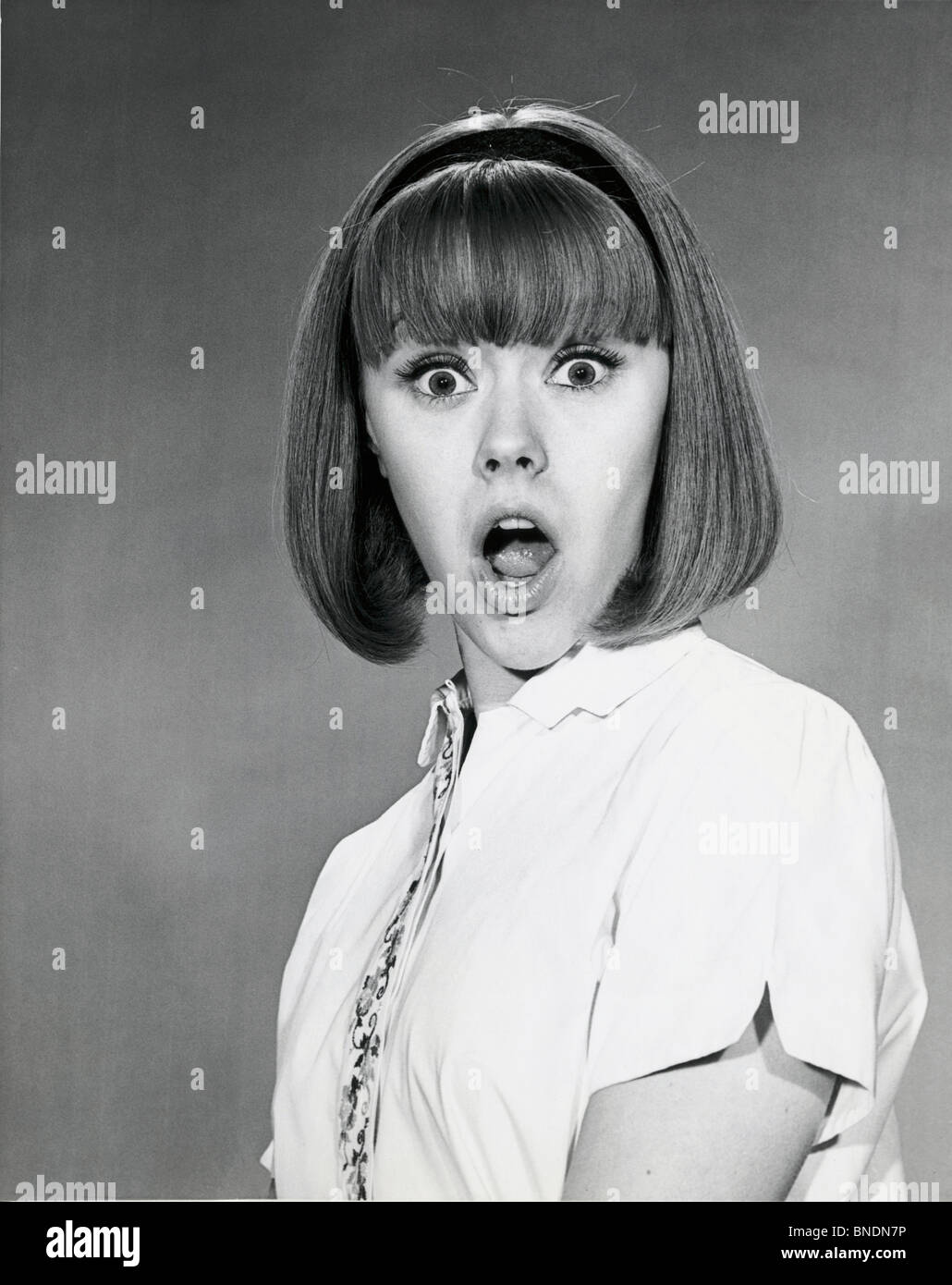 Surprised young woman hi-res stock photography and images - Alamy
