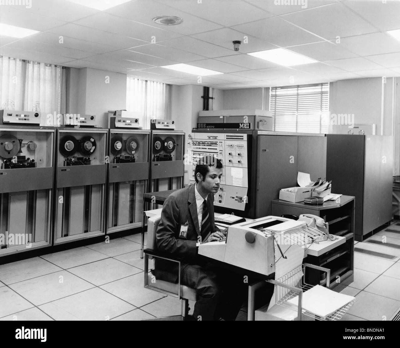 Technician using computer in computer laboratory Stock Photo Alamy