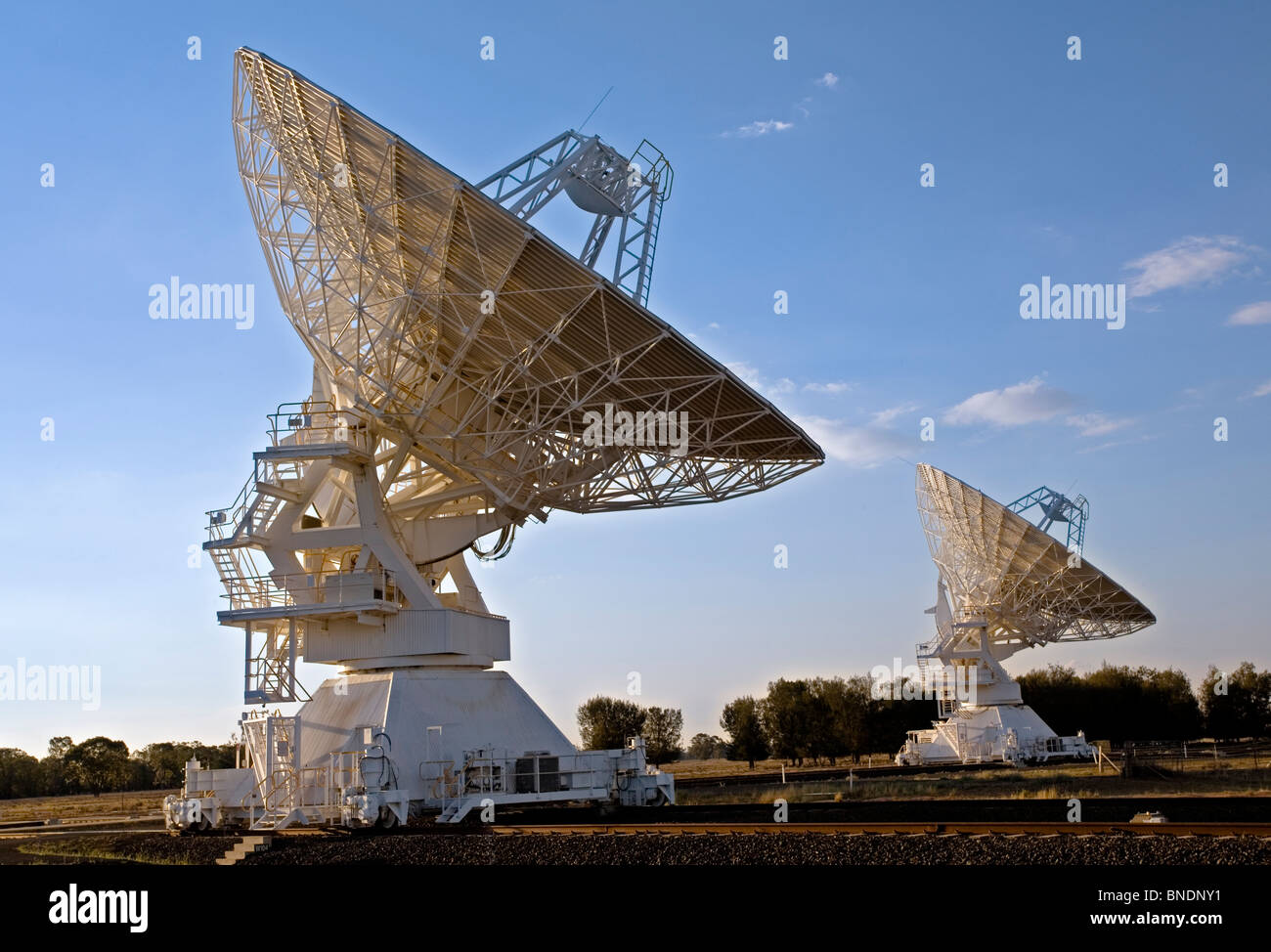 two compact array radio telescopes, photographed in the late afternoon, Narrabri, NSW, Australia Stock Photo