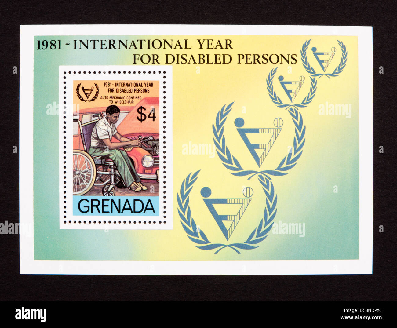 Souvenir sheet from Grenada depicting a man in a wheelchair Stock Photo