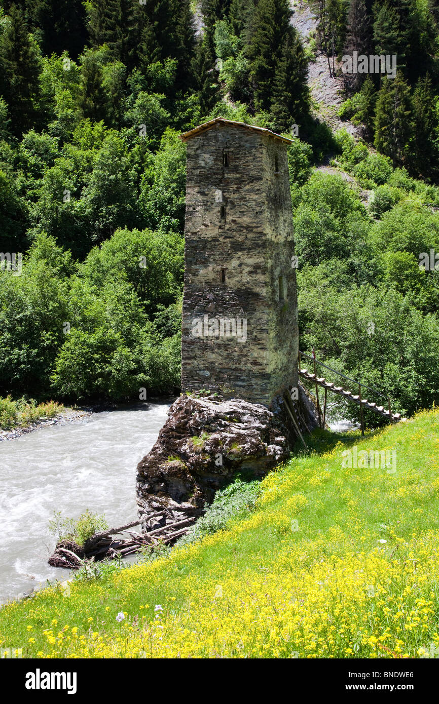 Tower on a rock on the road from Mestia to Ushguli in Svaneti, Georgia Stock Photo