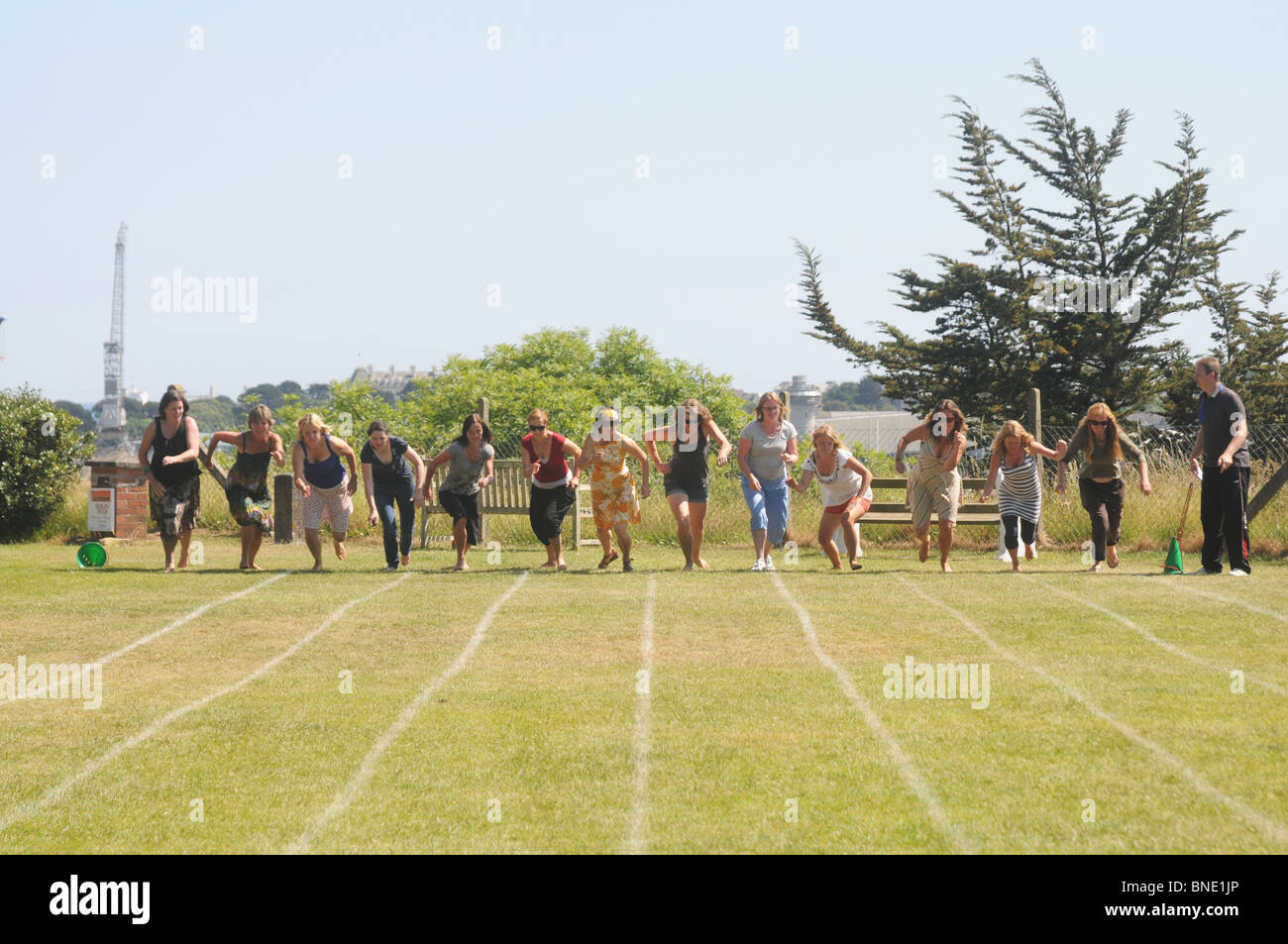 The start of the mothers 100 yard race on school sports day at Flushing