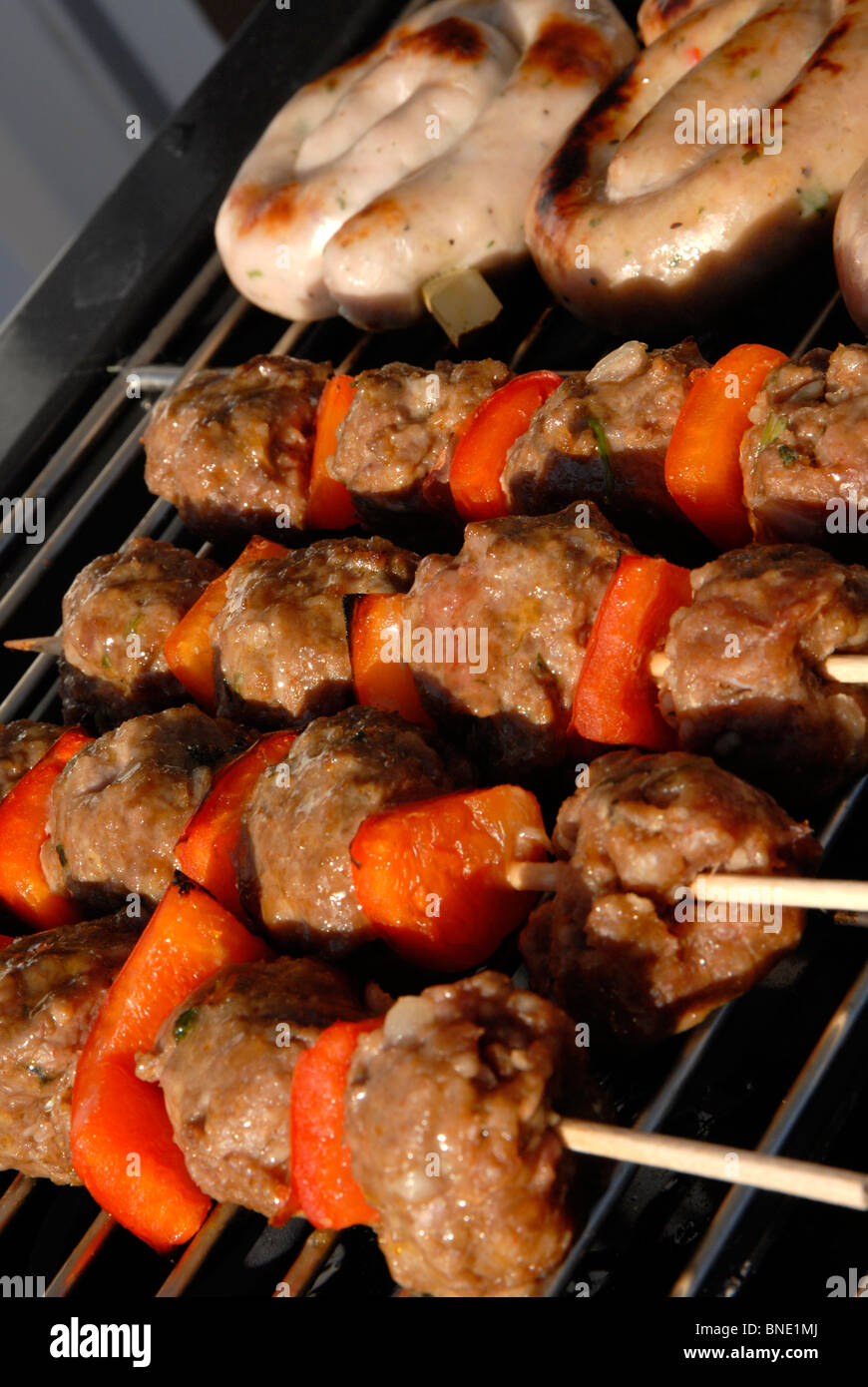 Lamb kebabs on barbeque Stock Photo