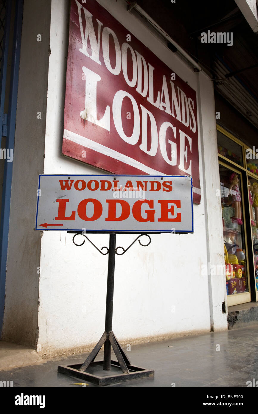Signs for the Woodlands Lodge in Trichur (Thrissur) in Kerala, India. Stock Photo