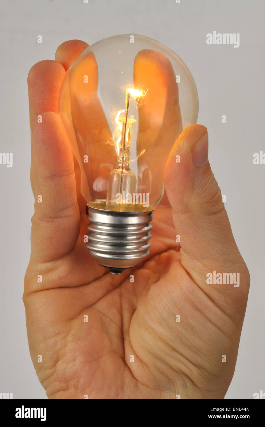 Hand with Light Bulb Stock Photo