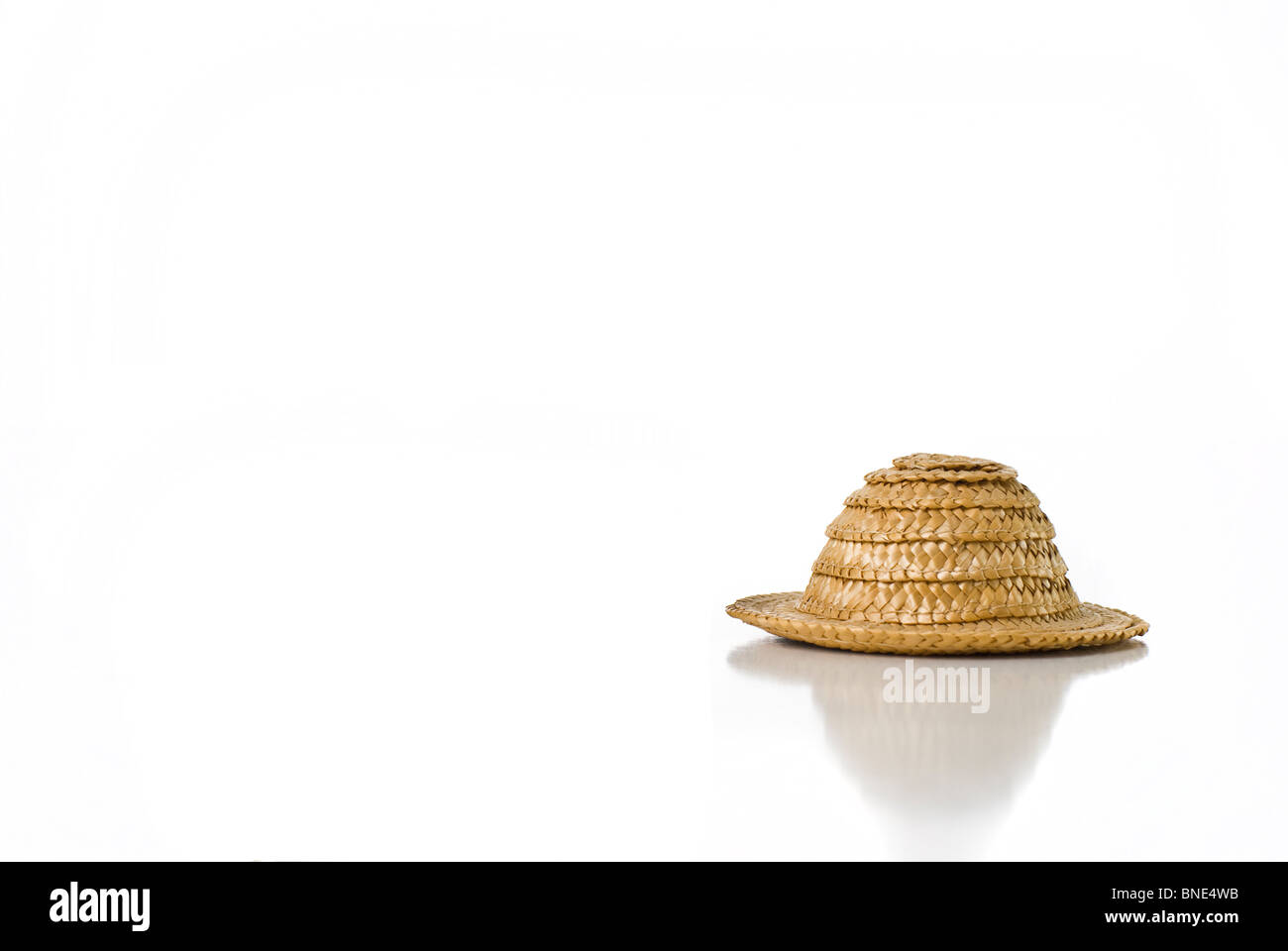A small straw hat Stock Photo Alamy