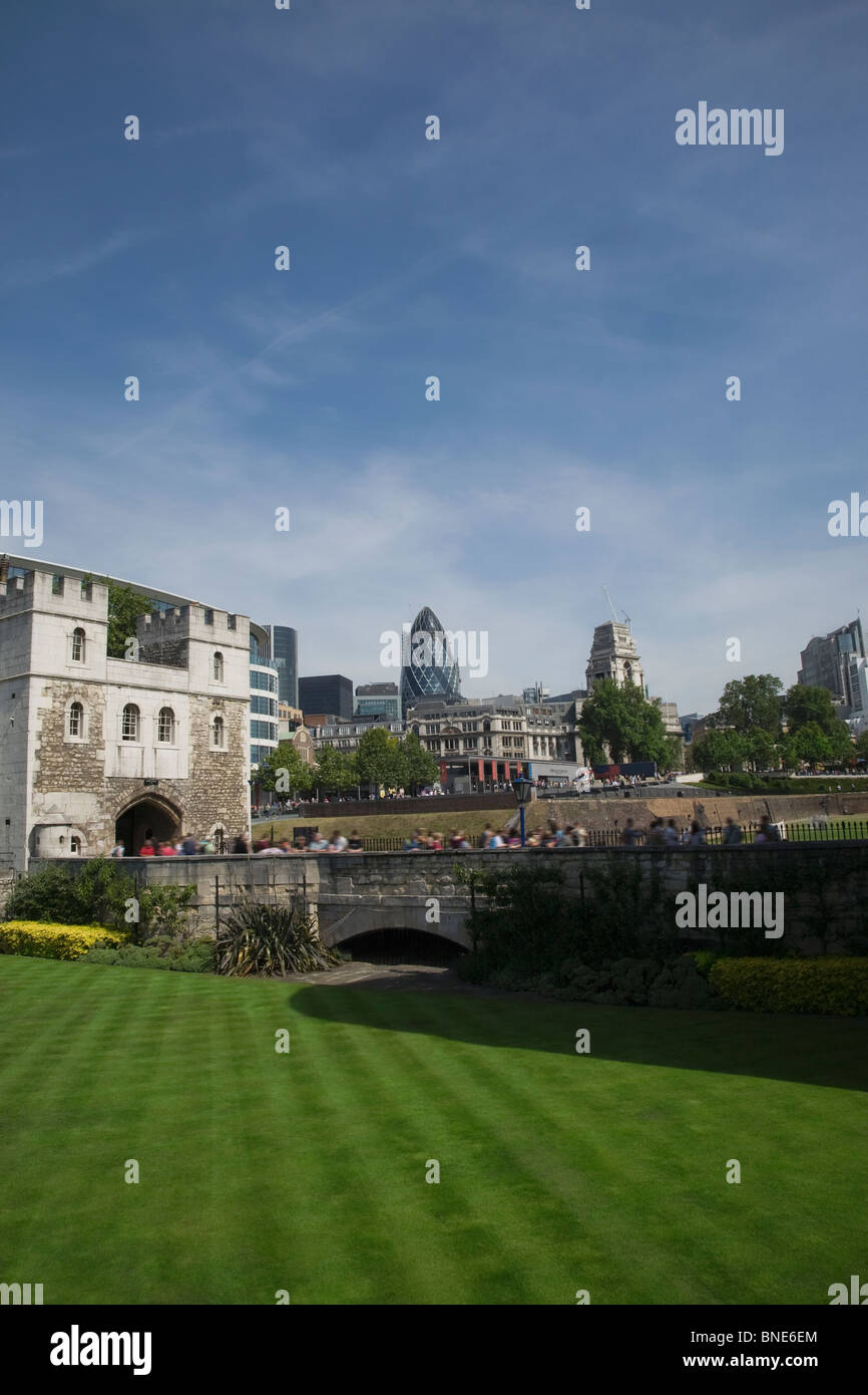 The entrance to the Tower of London with The Gherkin and City of London in the background, Stock Photo