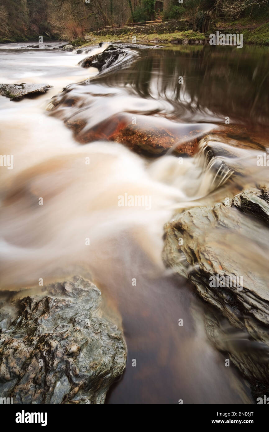 The Sir Thomas Phillips weir on the River Roe in the Roe Valley Country Park near Limavady, County Derry, Northern Ireland Stock Photo