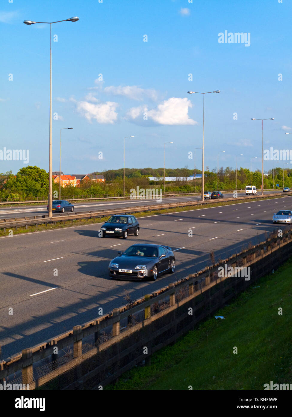Cars travelling on the M1 in Leicestershire England UK the first motorway to be built in Britain