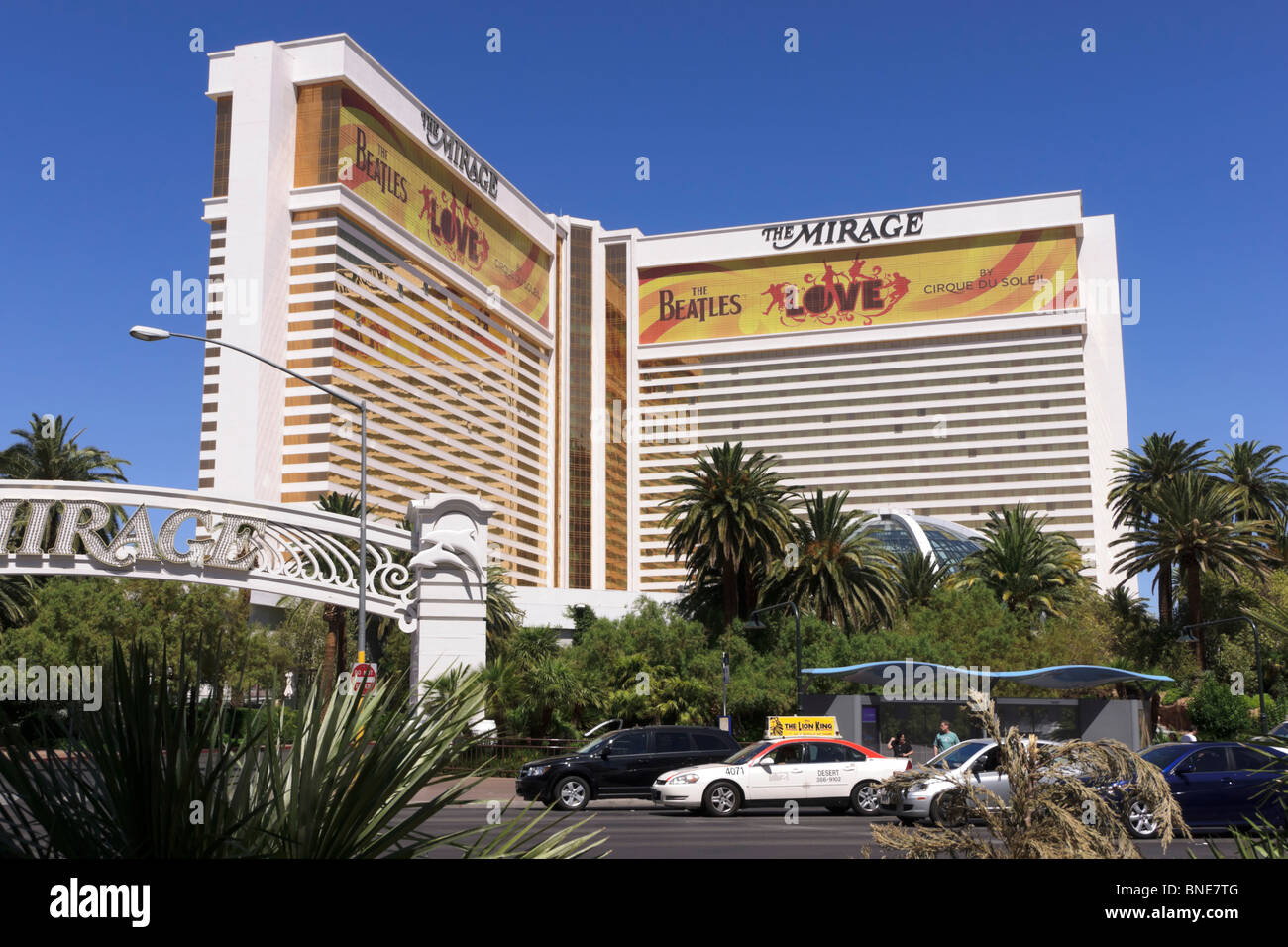 The Mirage, an MGM resort hotel on the Las Vegas strip, with Cirque du Soleil advert Beatles 'Love' show Stock Photo