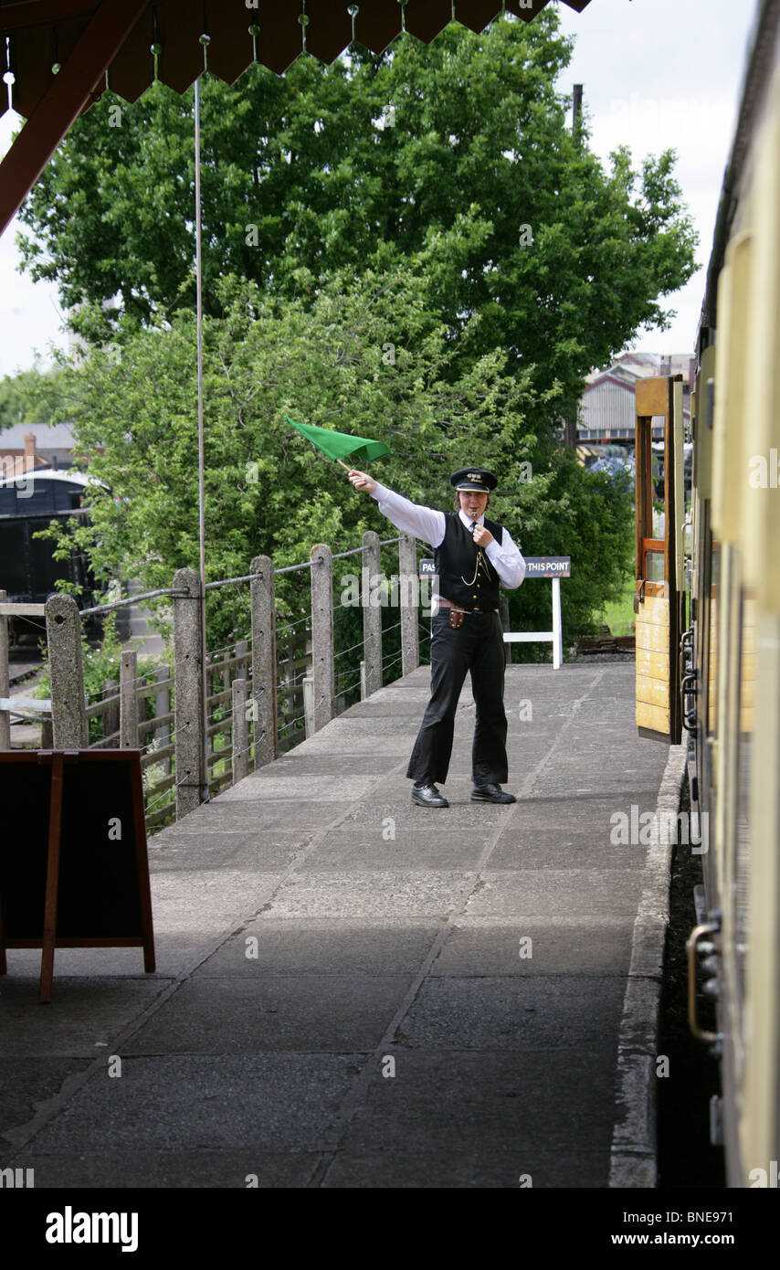 Train Guard Signalling No. 3738, Great Western Railway Steam Locomotive to Proceed, Didcot Railway Centre and Museum, Didcot. Stock Photo