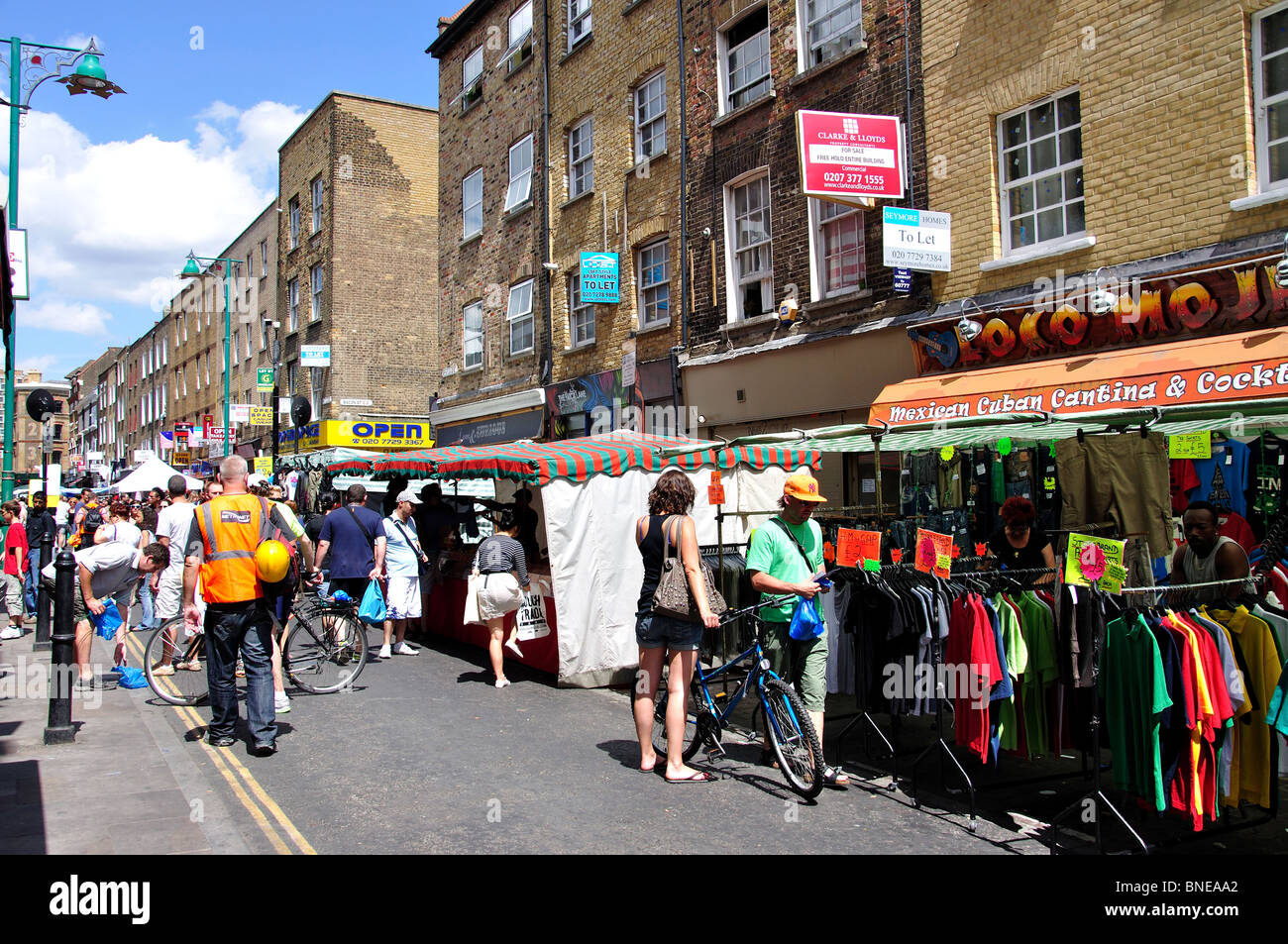 Market stalls, Brick Lane Market, Spitalfields, The London Borough of Tower Hamlets, Greater London, England, United Kingdom Stock Photo
