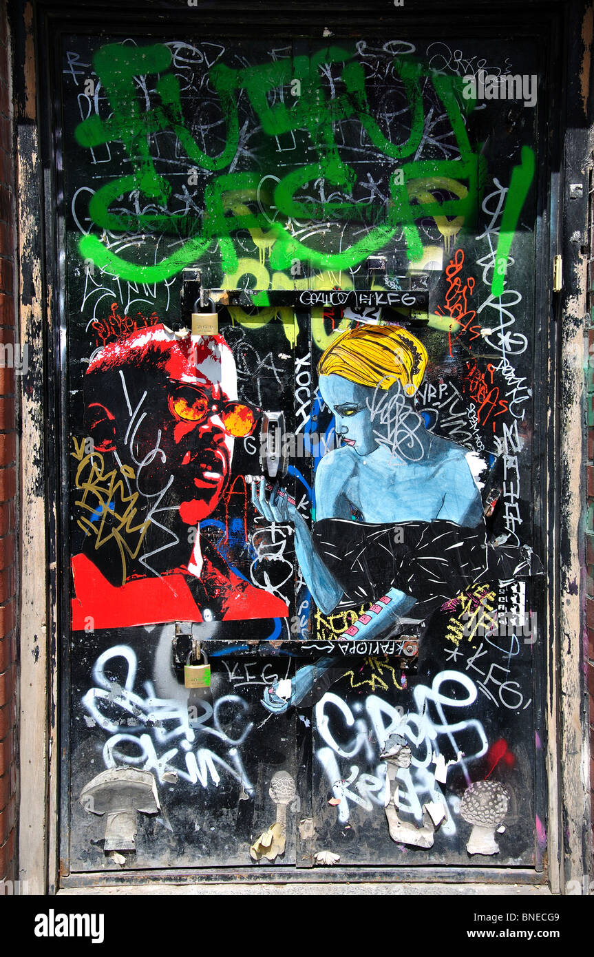 Grafitti on door, Brick Lane Market, Spitalfields, The London Borough of Tower Hamlets, London, England, United Kingdom Stock Photo