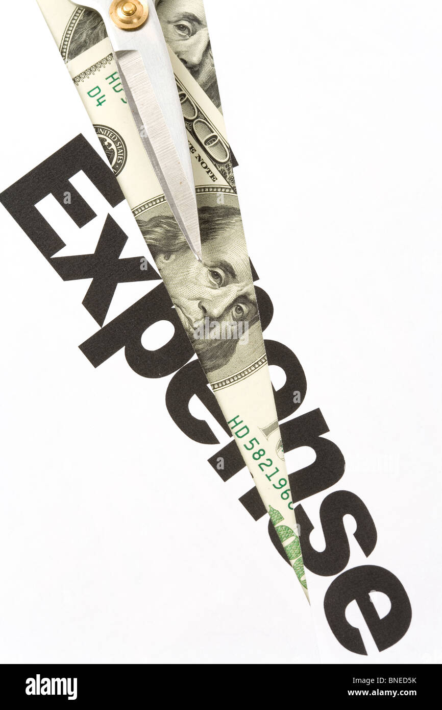 text of Expense and scissors, concept of Expense cut Stock Photo