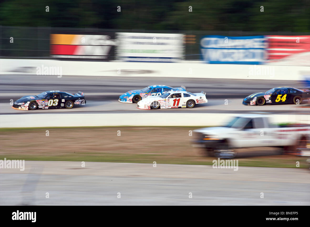 Cars racing On circuit at Nascar Racing in Houston, Texas, USA Stock Photo