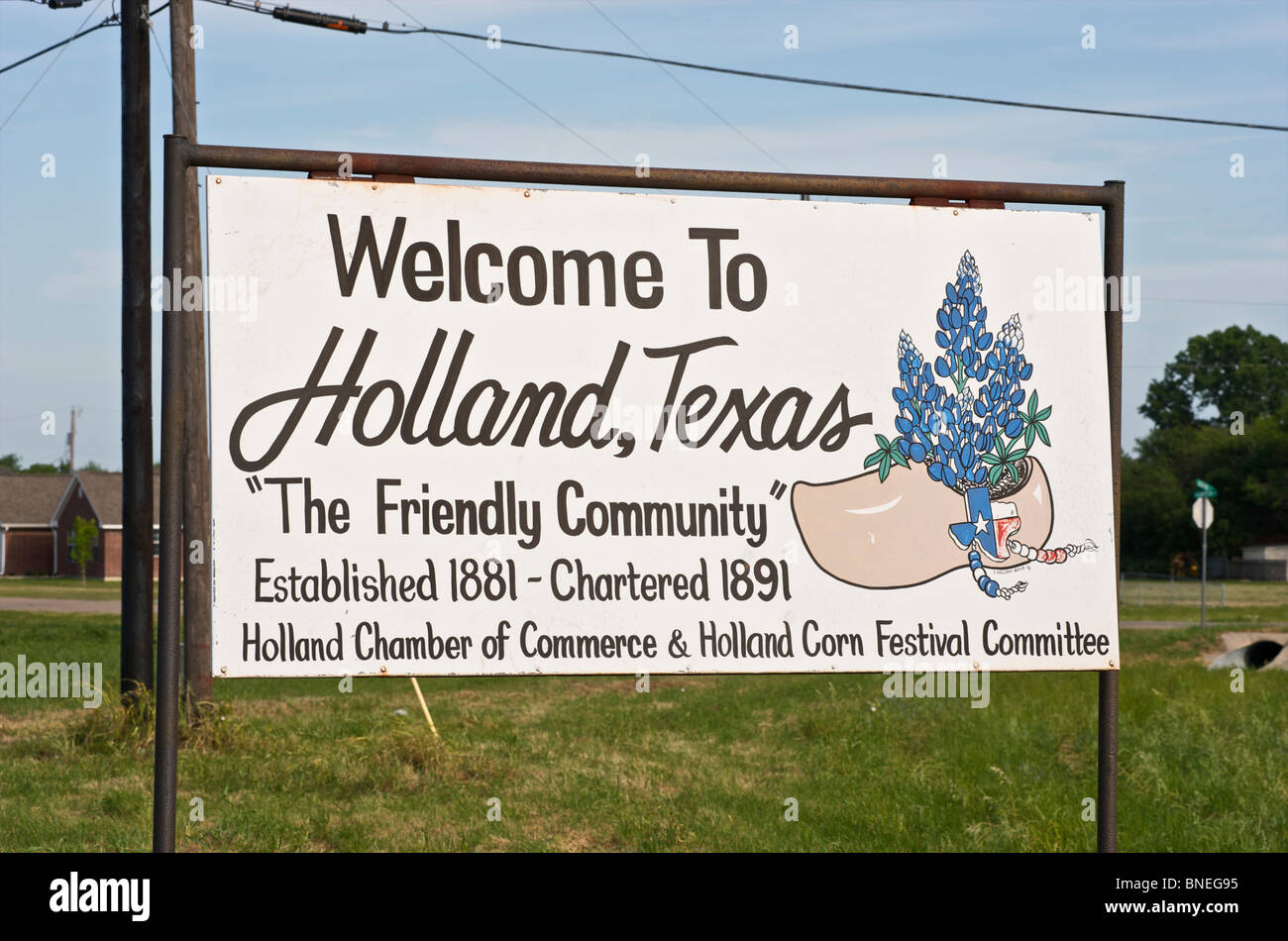Welcome sign with wooden shoe symbol town of Holland, Texas, USA Stock Photo
