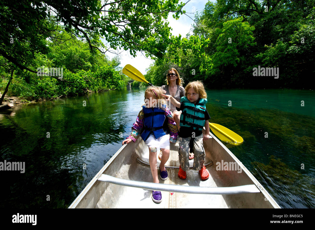 Family has rented canoe on the Colorado River in Austin, Zilkar Park Texas, USA Stock Photo