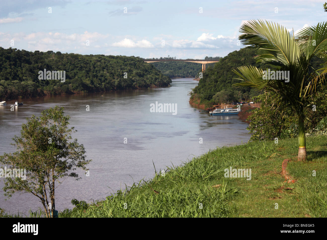 Rio Iguazu looking towards Tancredo Neves Bridge also known as Fraternity Bridge Stock Photo
