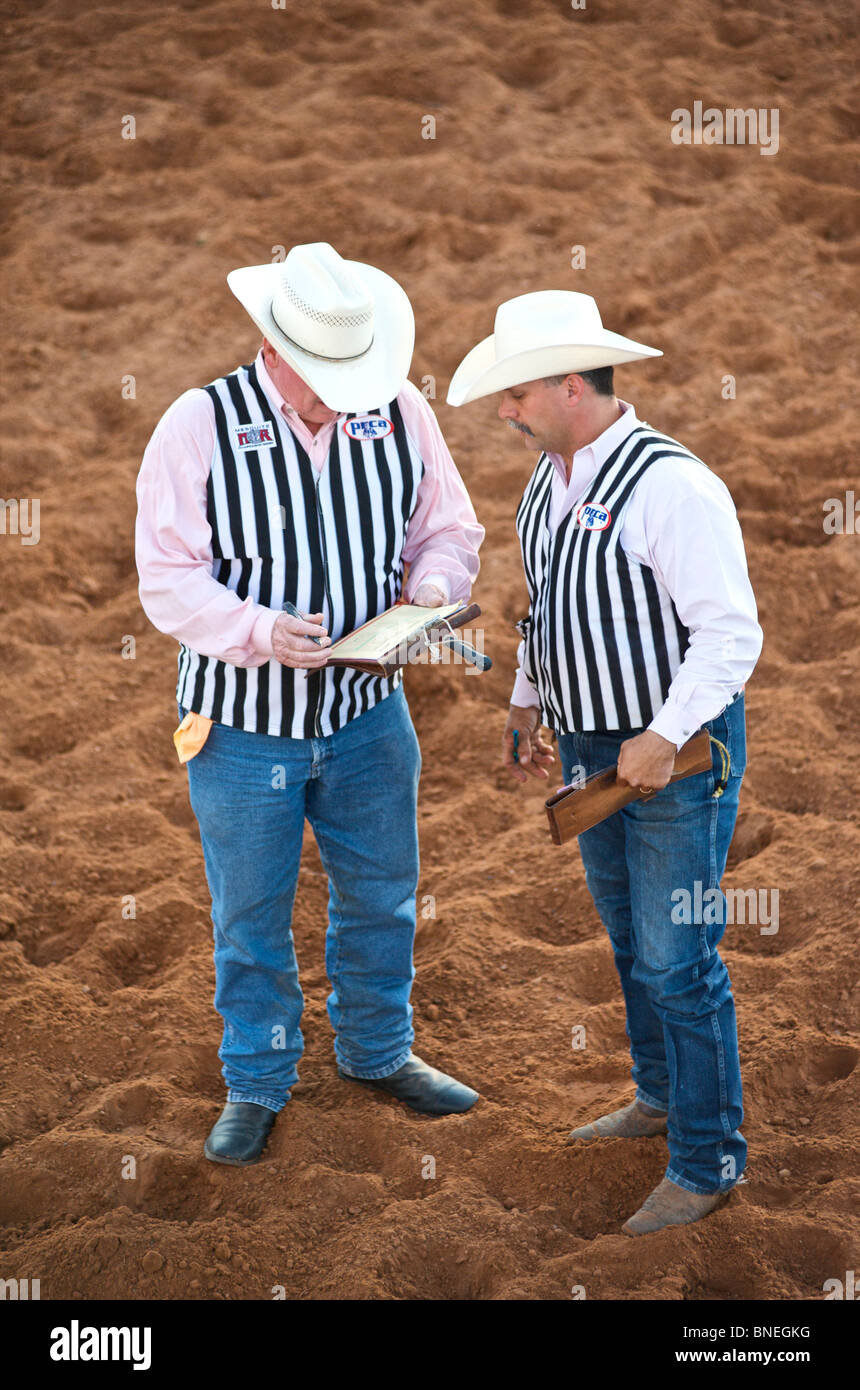 Referees in discussion at PRCA rodeo event in Bridgeport Texas, USA Stock Photo