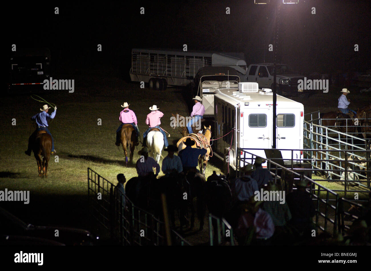 Cowboy members of PRCA riding horses backstage in Bridgeport Texas, USA Stock Photo