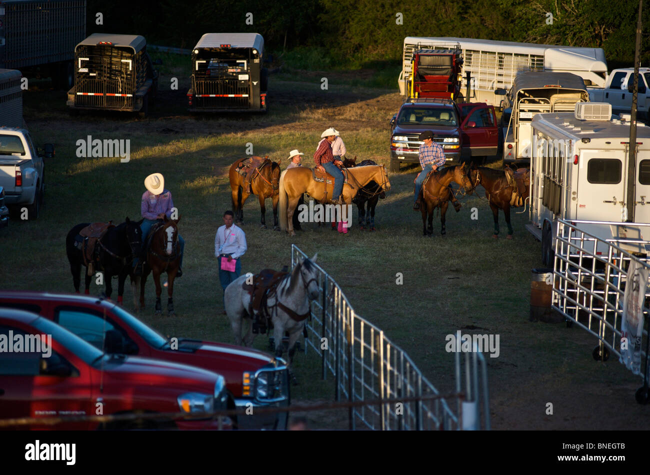 Cowboy members of PRCA preparing backstage for rodeo event in Bridgeport, Texas, USA Stock Photo