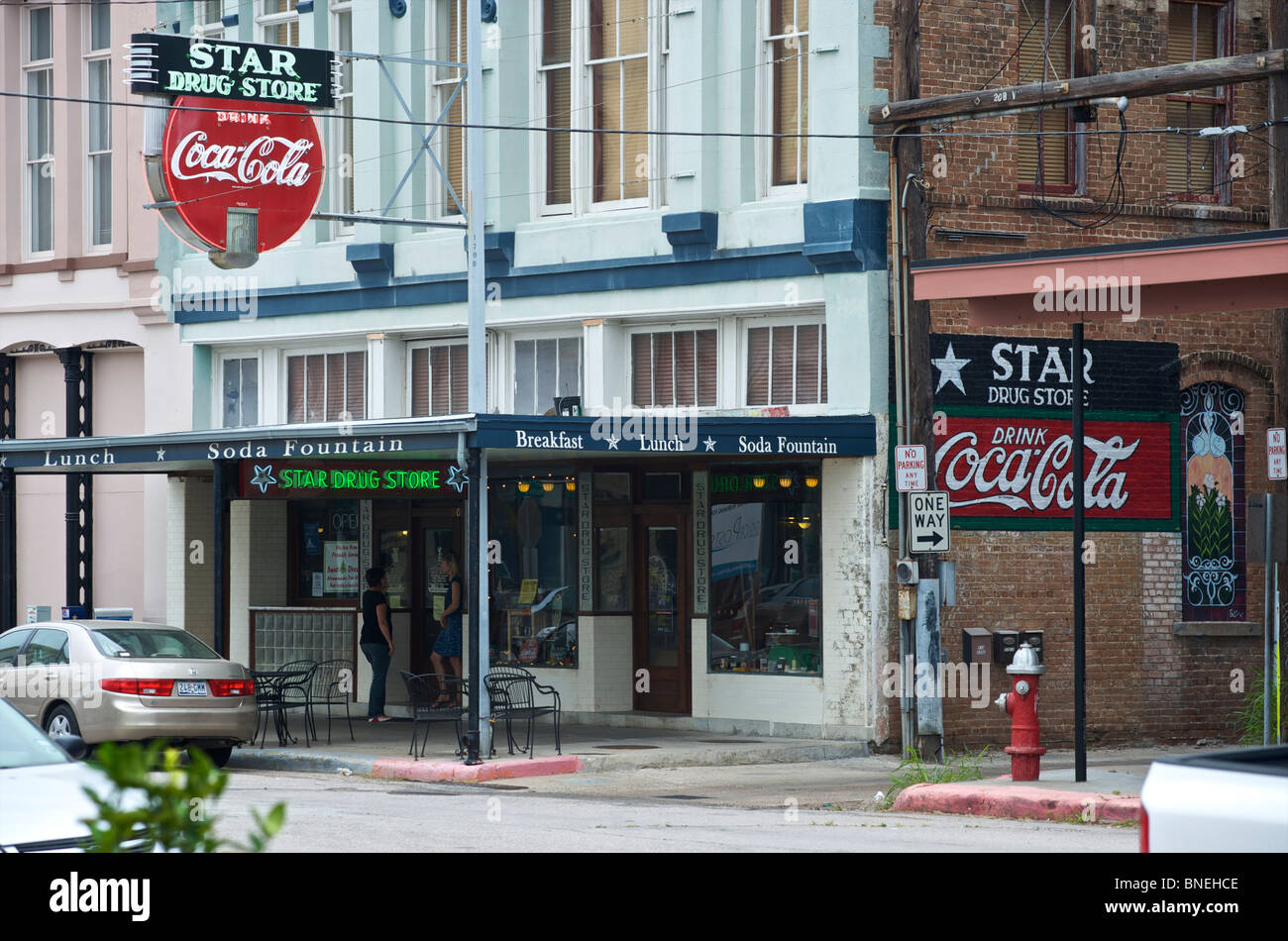 Famous star drug store with the oldest Coca Cola neon sign downtown in Galveston, Texas, USA Stock Photo