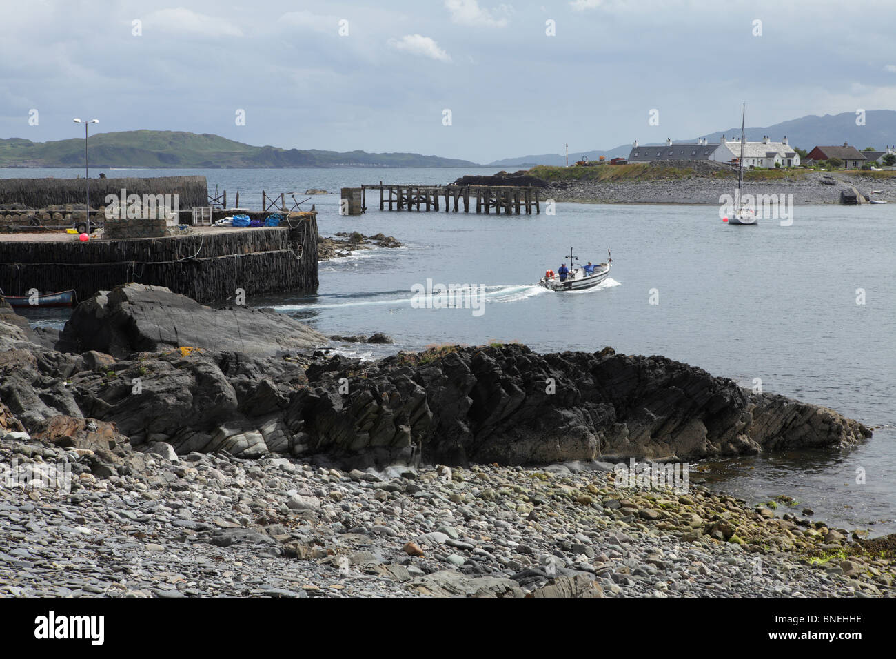 The tiny Easdale private ferry running between Seil Island and nearby Easdale island. Stock Photo