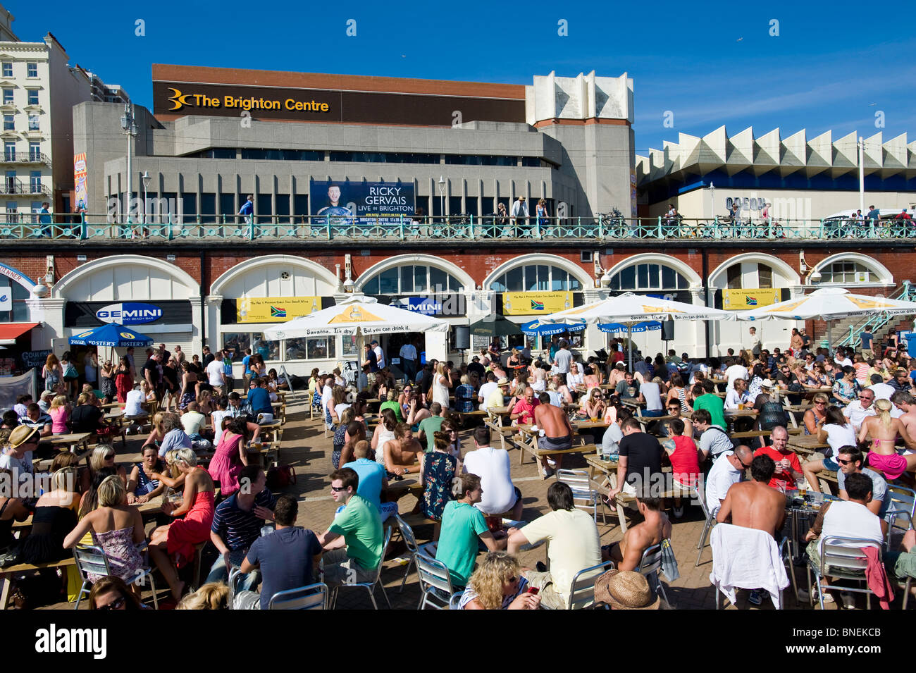 Crowded beach bars, Brighton, East Sussex, United Kingdom Stock Photo