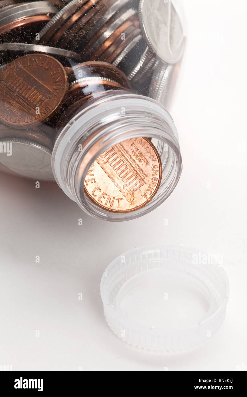 Plastic Bottle and Coins,Dollar with white background Stock Photo Alamy