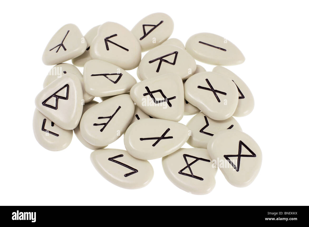 rune stones with black symbols for fortune telling Stock Photo - Alamy