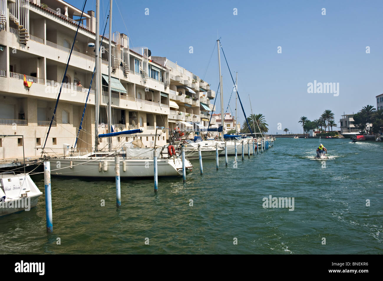 Villas with Boat Docks on the Canal Network at Empuriabrava Holiday Town Costa Brava Catalonia Spain Espana Stock Photo