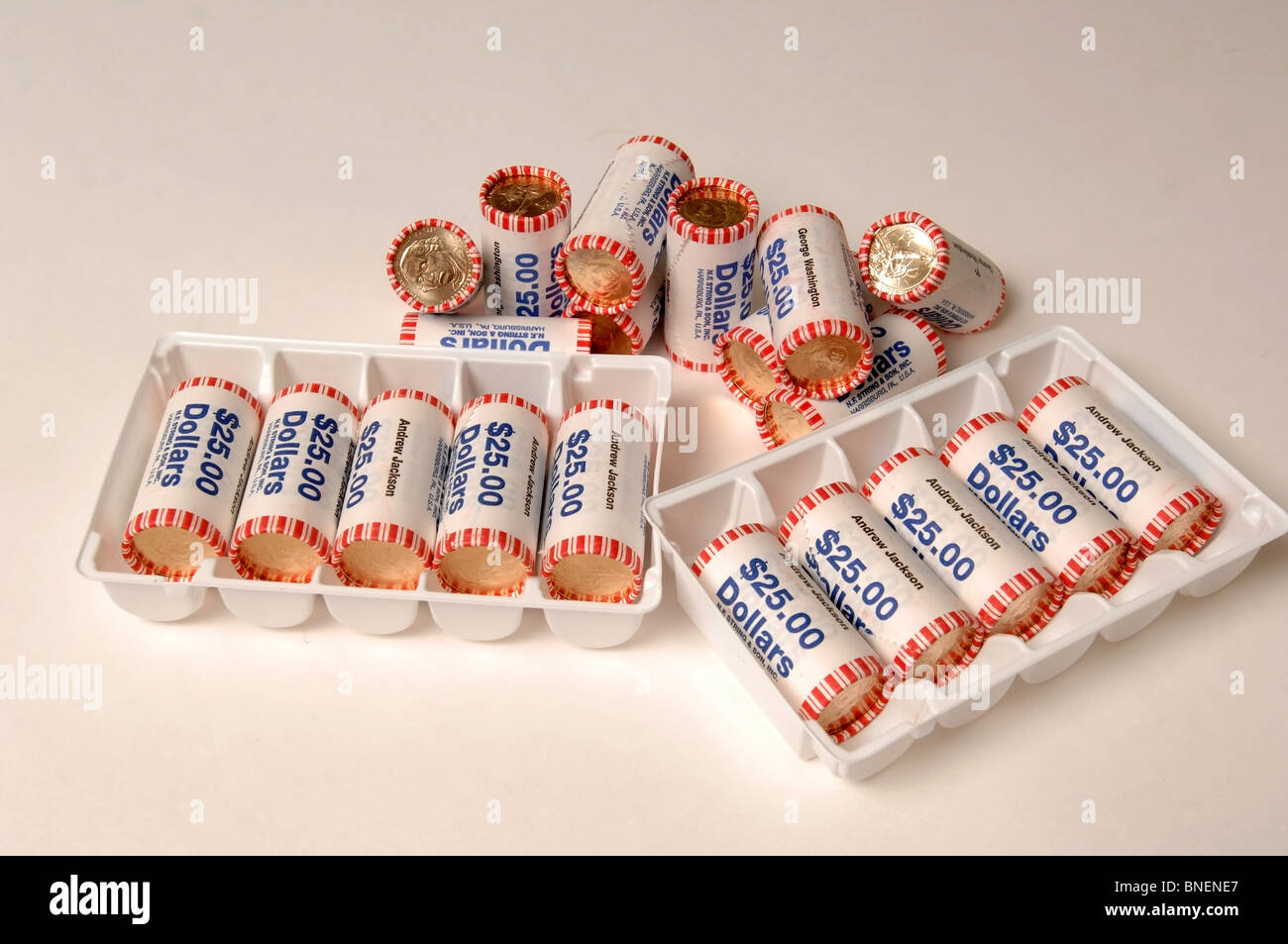 American Dollar Coins, direct from the US Mint, rolled in 25 rolls. (Golden coins Stock Photo