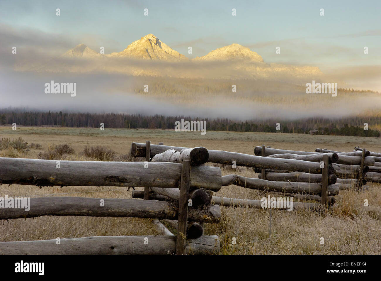 Misty dawn over the Sawtooth Mountains, Rocky Mountains, Idaho, USA Stock Photo
