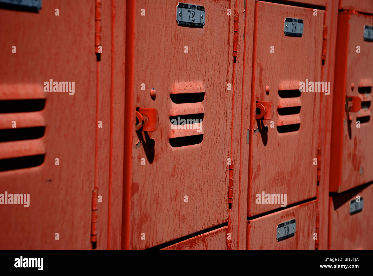 Red metal lockers at the public pool in Moab, Utah Stock Photo