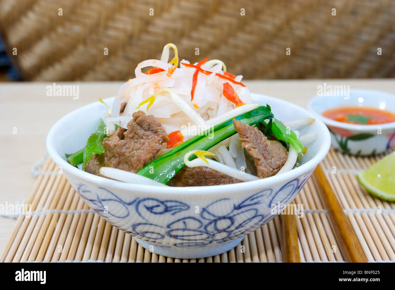 beef noodle beansprouts chilli and choy sum chilli dip Stock Photo