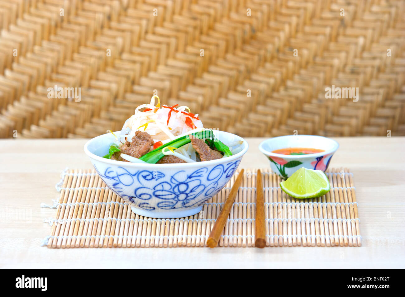 beef noodle beansprouts chilli and choy sum chilli dip Stock Photo