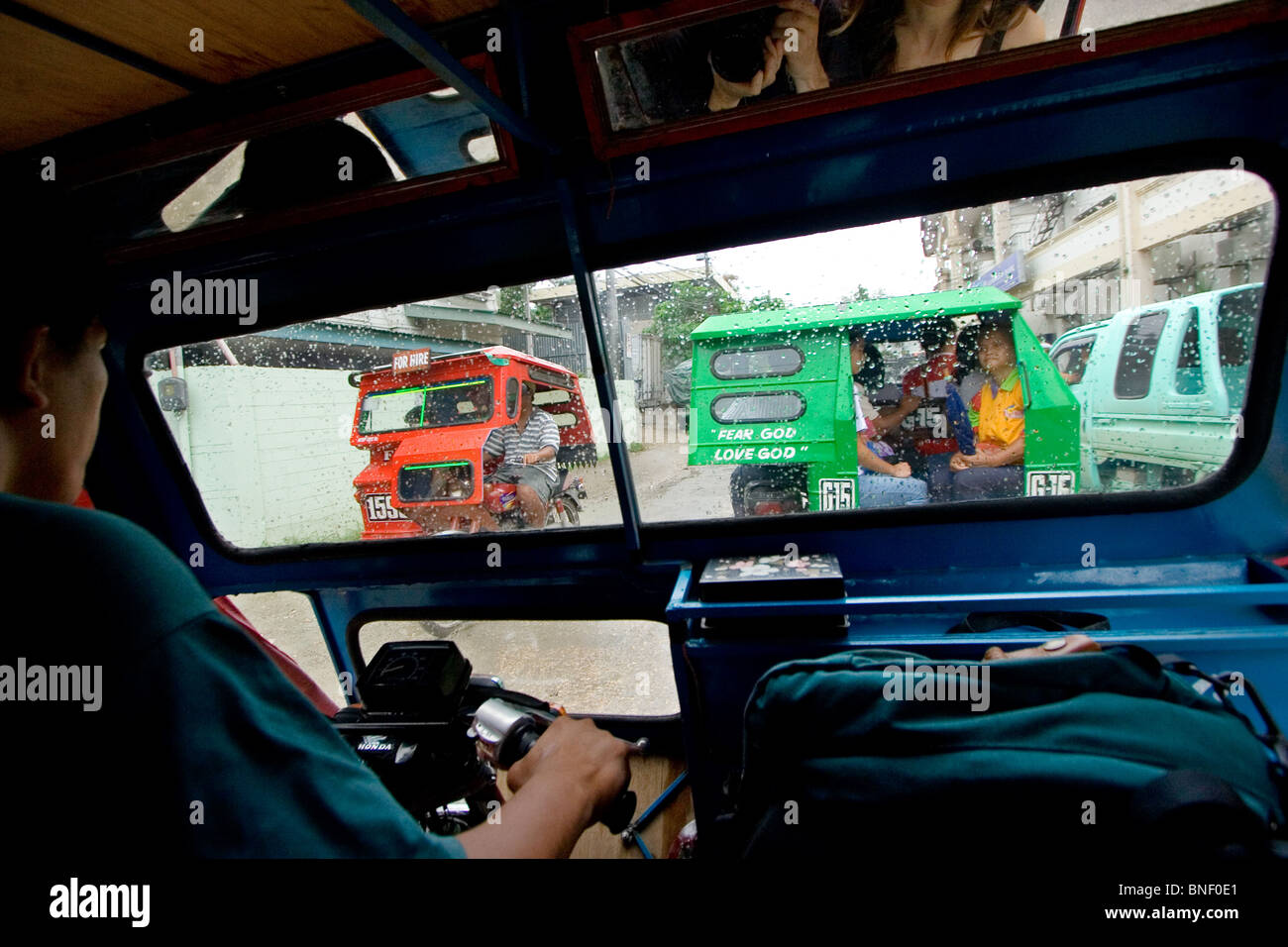 View from inside a tricycle, Tagbilaran, Bohol, Philippines Stock Photo