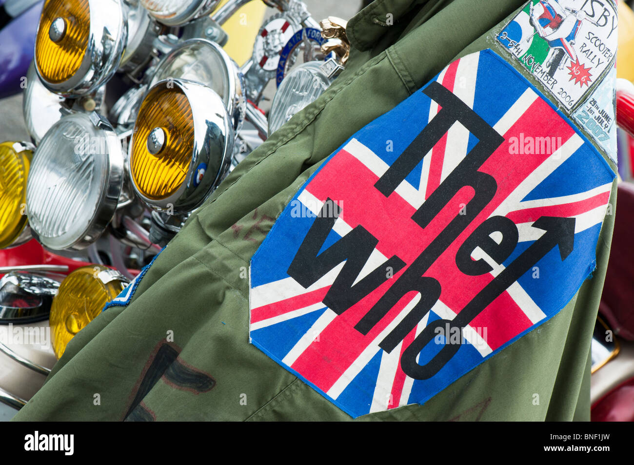 Mod jacket on a Lambretta custom scooter with logos and union jack decal Stock Photo