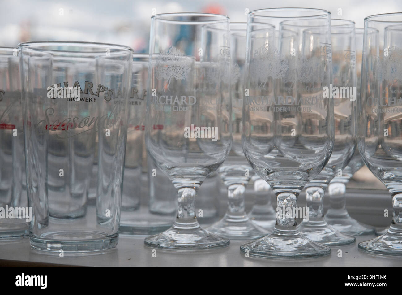 Branded glassware in the Sharp's Brewery shop, Rock, Cornwall. Stock Photo