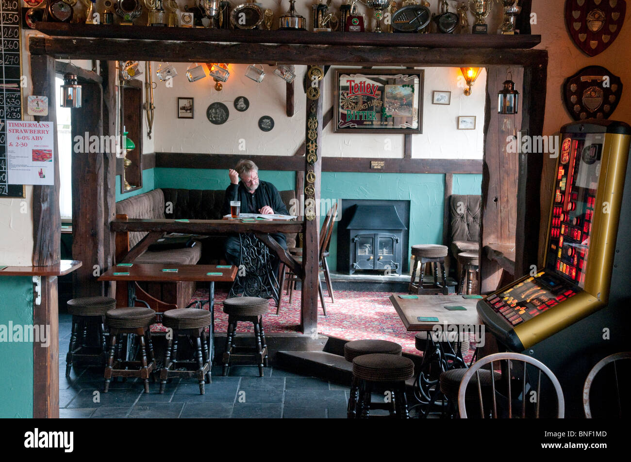 A man enjoys a pint of beer/lager in The Star Inn, Crowlas, a traditional pub in Cornwall. Stock Photo