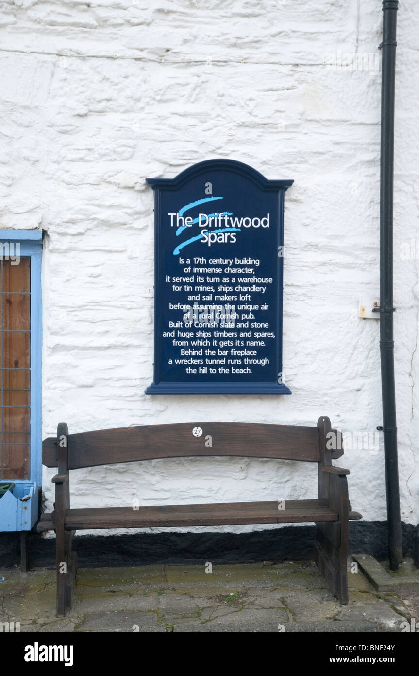 Bench and information sign at the Driftwoood Spars pub and hotel in Trevaunance Cove, St.Agnes, Cornwall Stock Photo