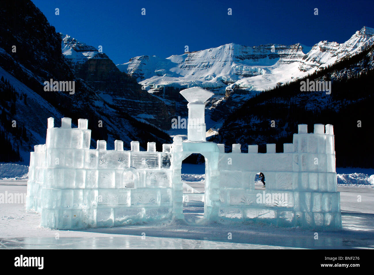 Ice castle on a frozen lake, Lake Louise, Victoria Peak, Banff National