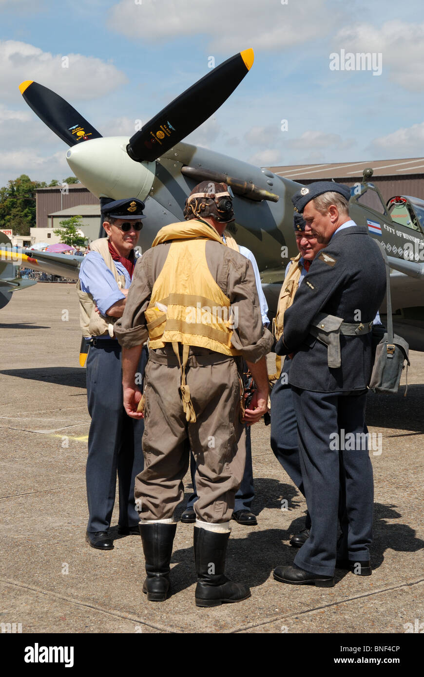 Battle Of Britain - WW2 Re-enactors With Spitfire at IWM Duxford Stock Photo