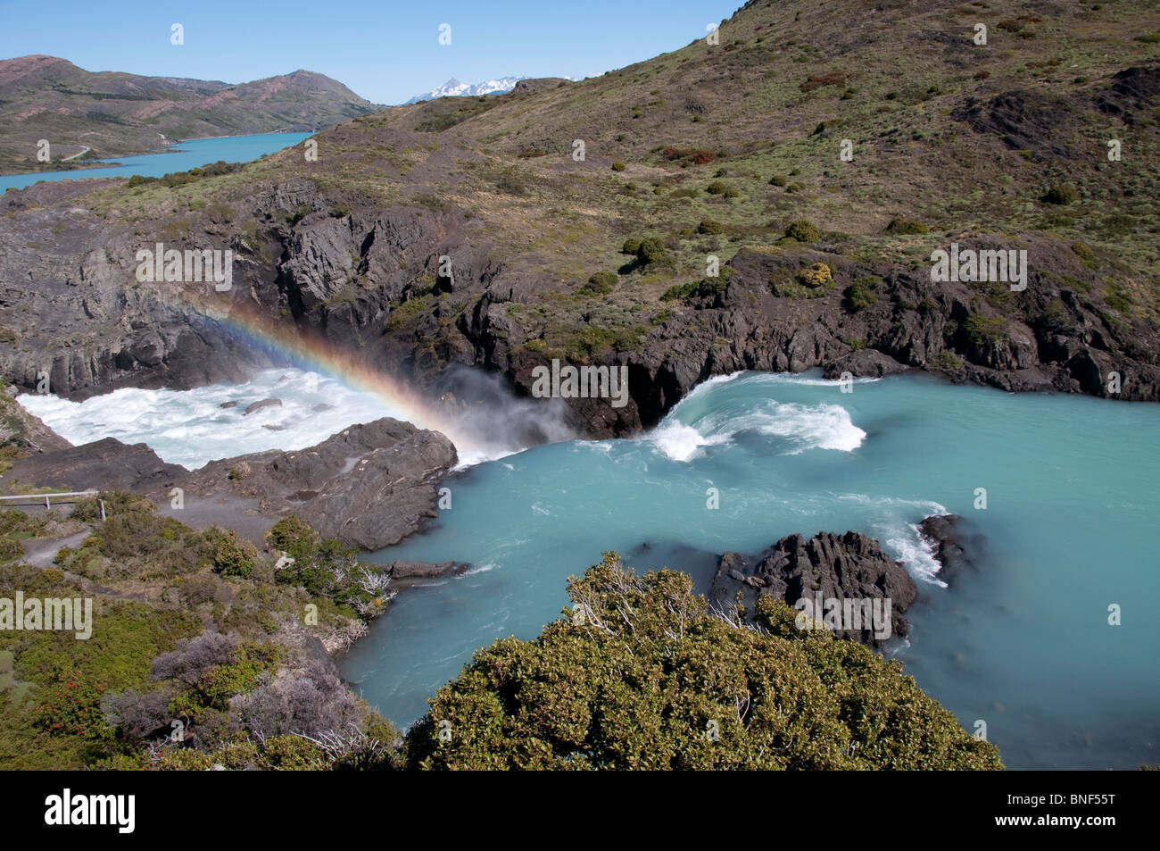 Lake flowing through rocks, Lake Pehoe, Torres Del Paine National Park ...