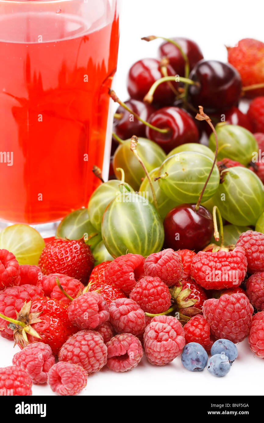 different kinds of berries with glass of juice Stock Photo Alamy