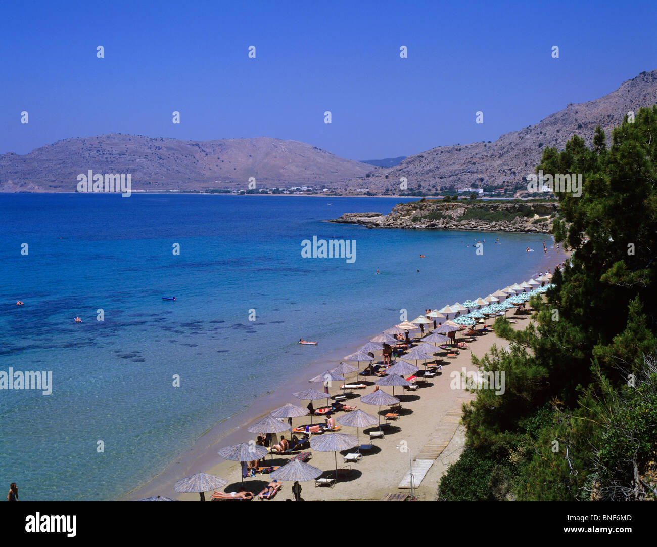 View of the picturesque beach at the resort of Pefkos in southern Rhodes near Lindos Stock Photo
