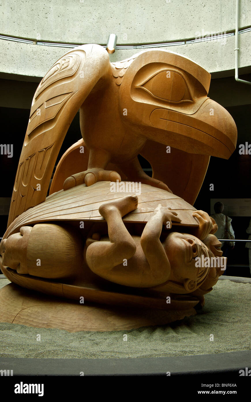 Carved yellow cedar wood sculpture The Raven and The First Men by Haida ...
