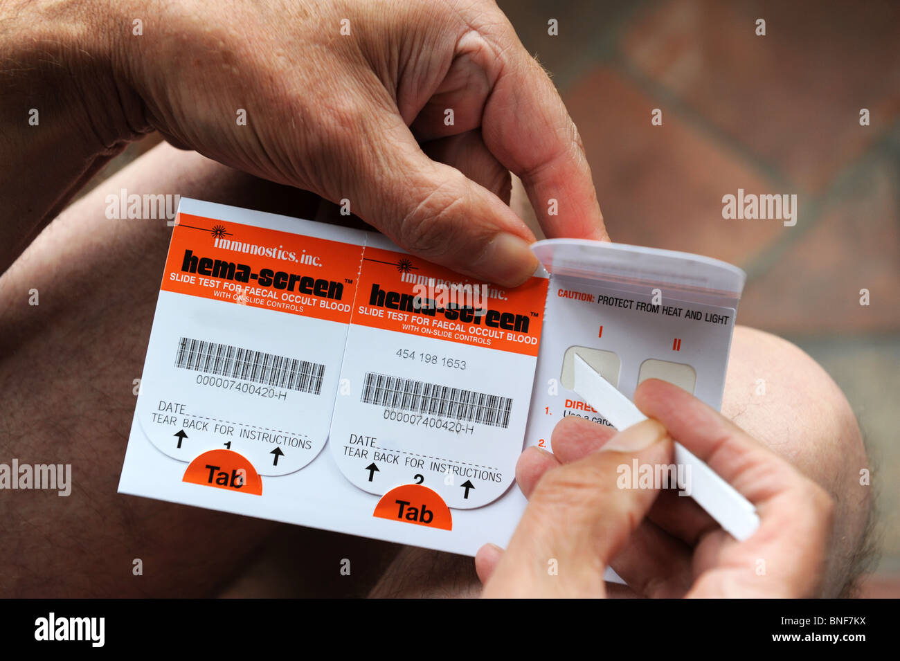 Man using bowel cancer screening test England UK Stock Photo 30453470 Alamy