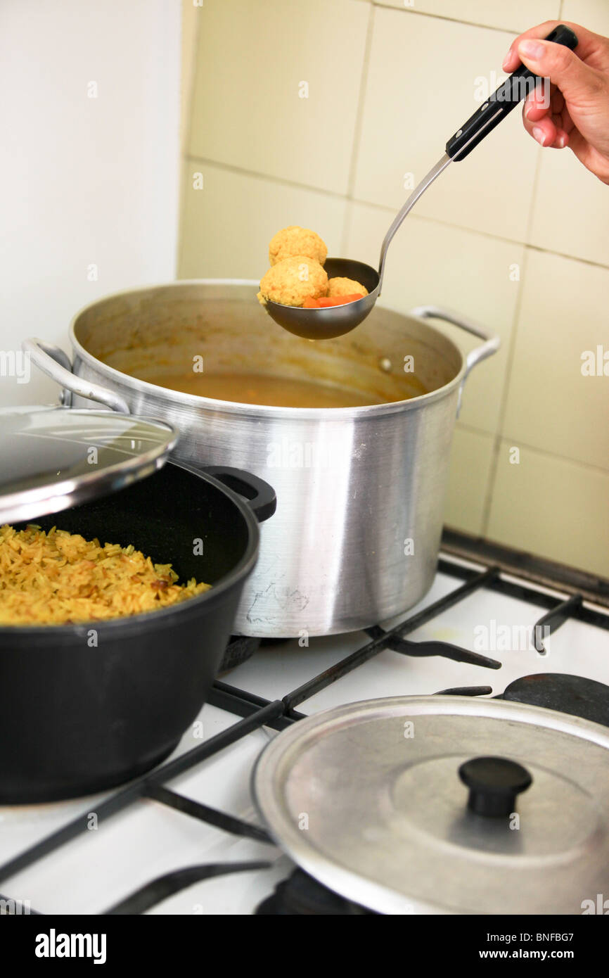 Food cooking on a gas stove Stock Photo Alamy