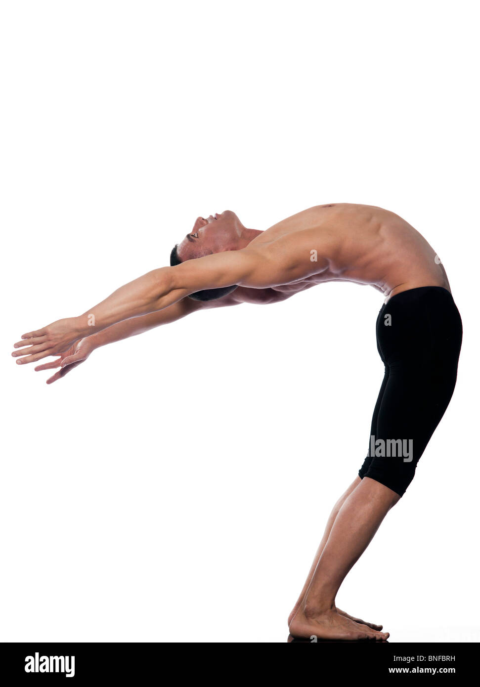 caucasian man stretching gymnastic balance isolated studio on white background Stock Photo